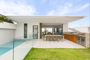The newly constructed home with high end fixtures and fittings faces east